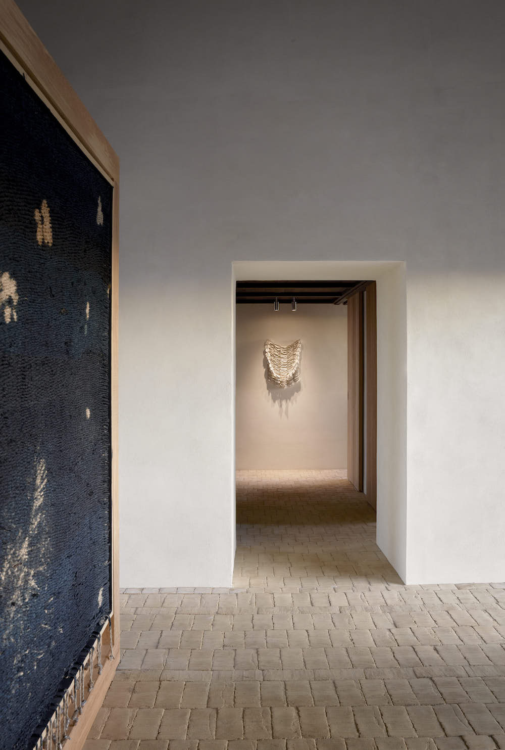 Hallway with art on the walls.