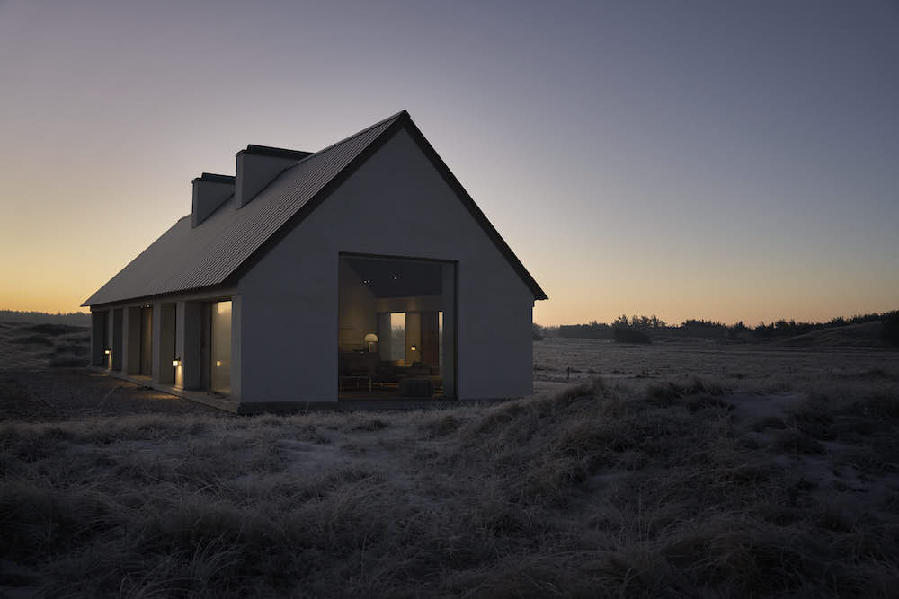 Modern Danish summer house at dawn.